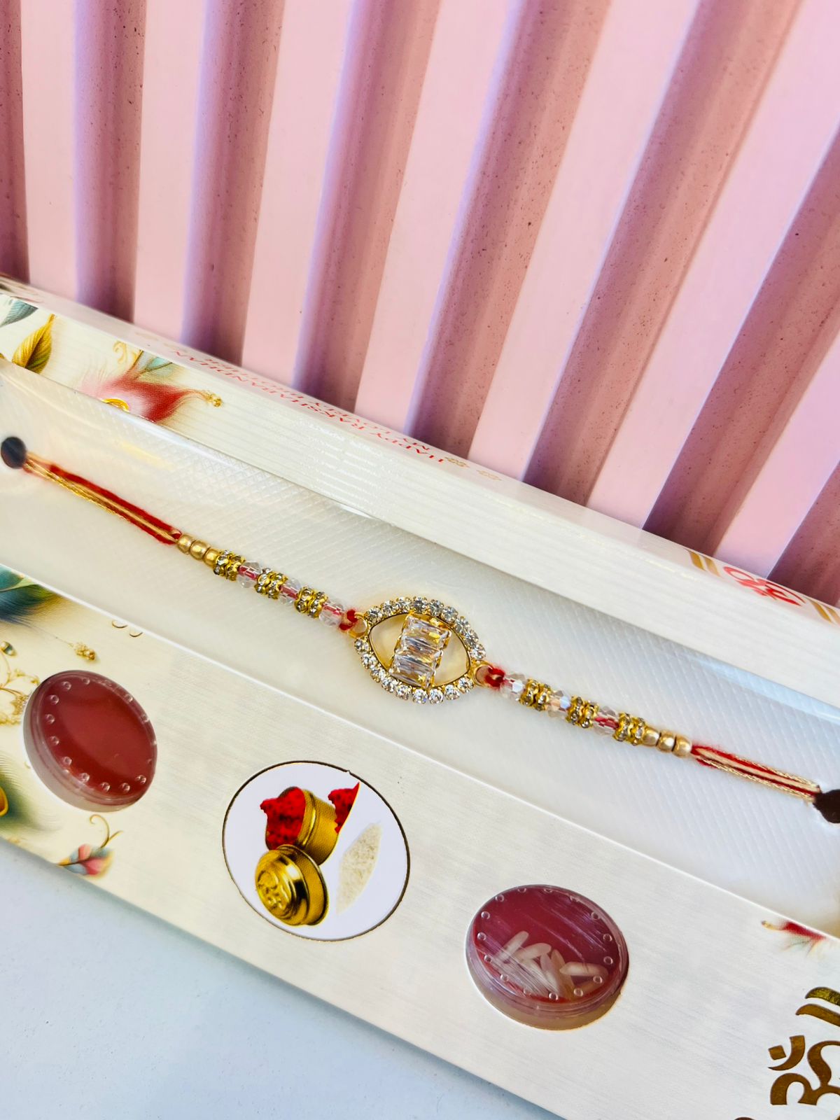 Divine Om Rakhi with Roli Chawal Gift