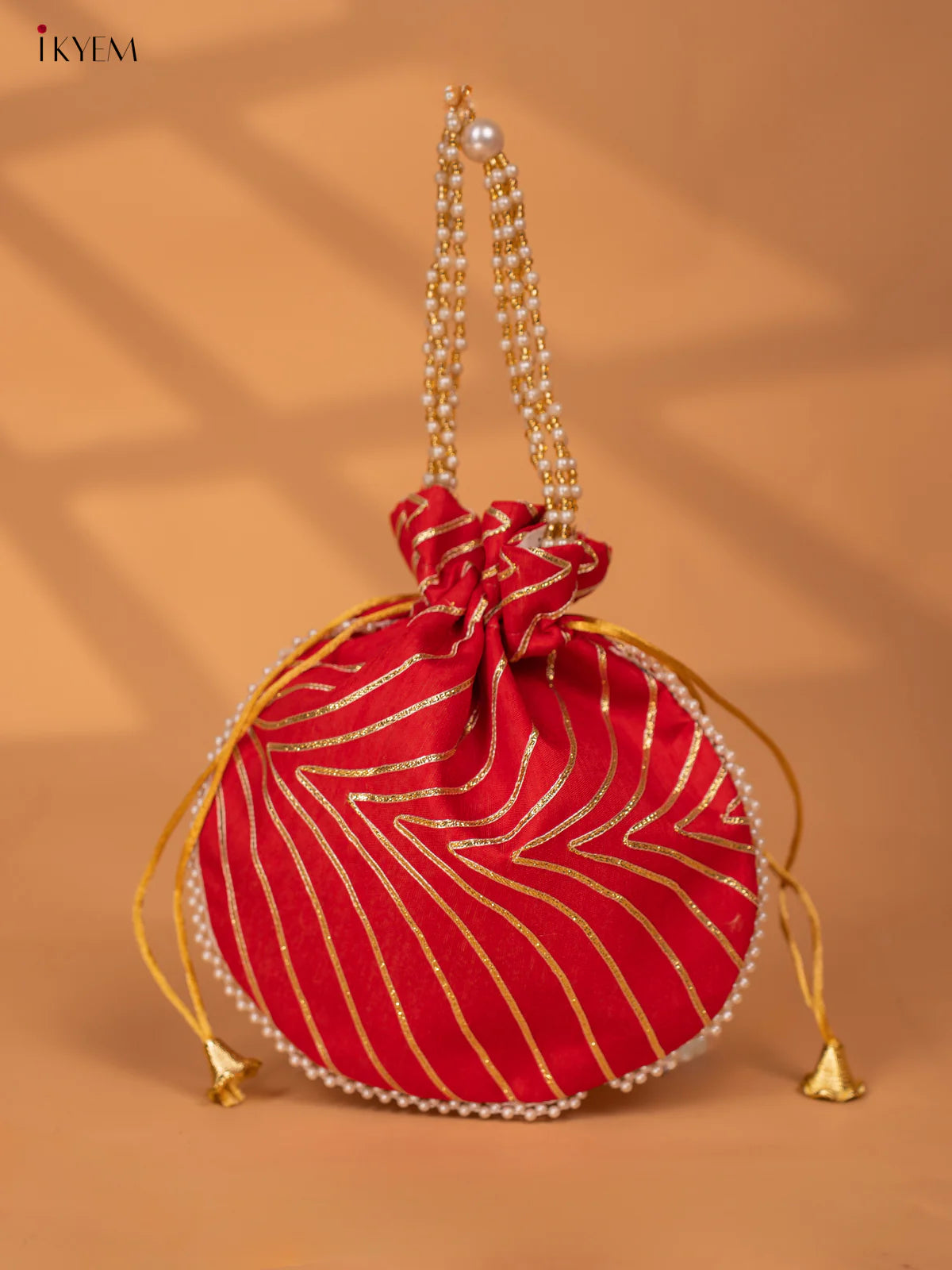 Elegant Pearl Handle Potli